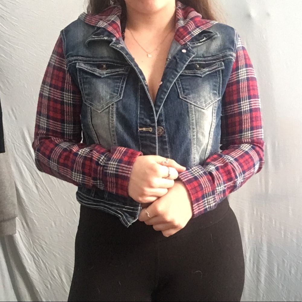Denim jacket with red flannel sleeves